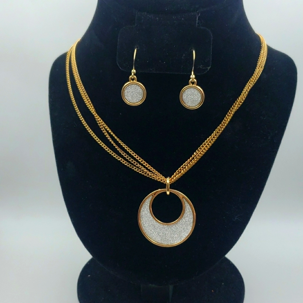 Sparkly white moon shaped necklace with matching earrings